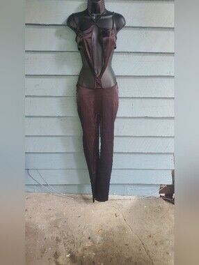 Shane Justin Sleek Cutout BlackJumpsuit